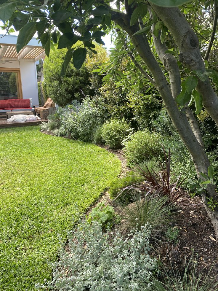 Landscaped lawn and native garden beds