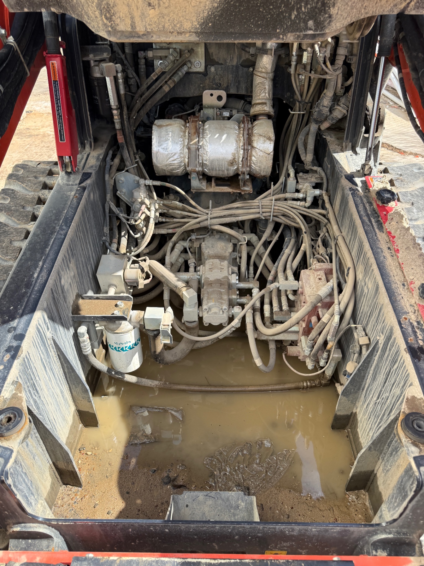Kubota Posi Track engine bay before