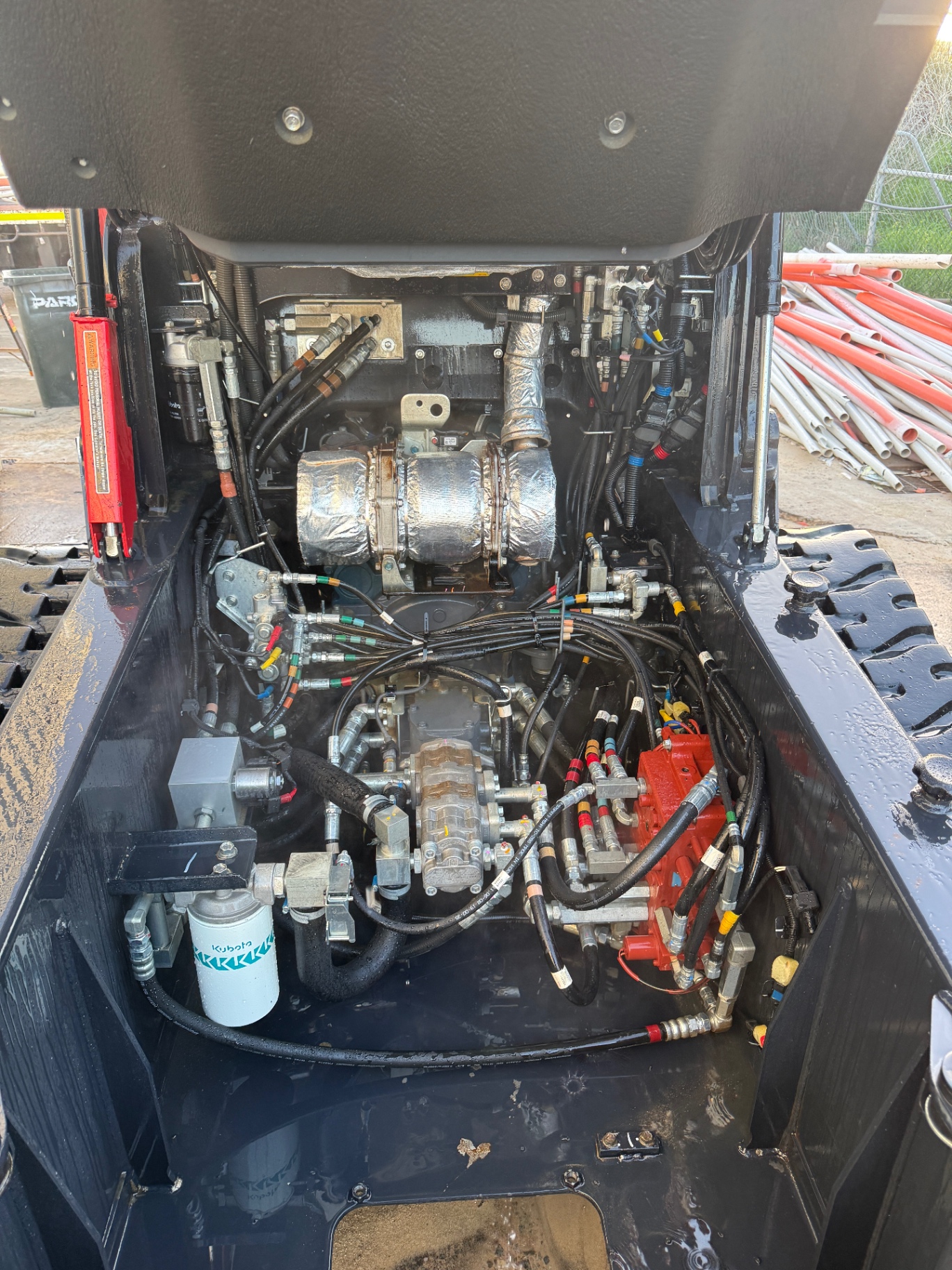 Kubota Posi Track engine bay after